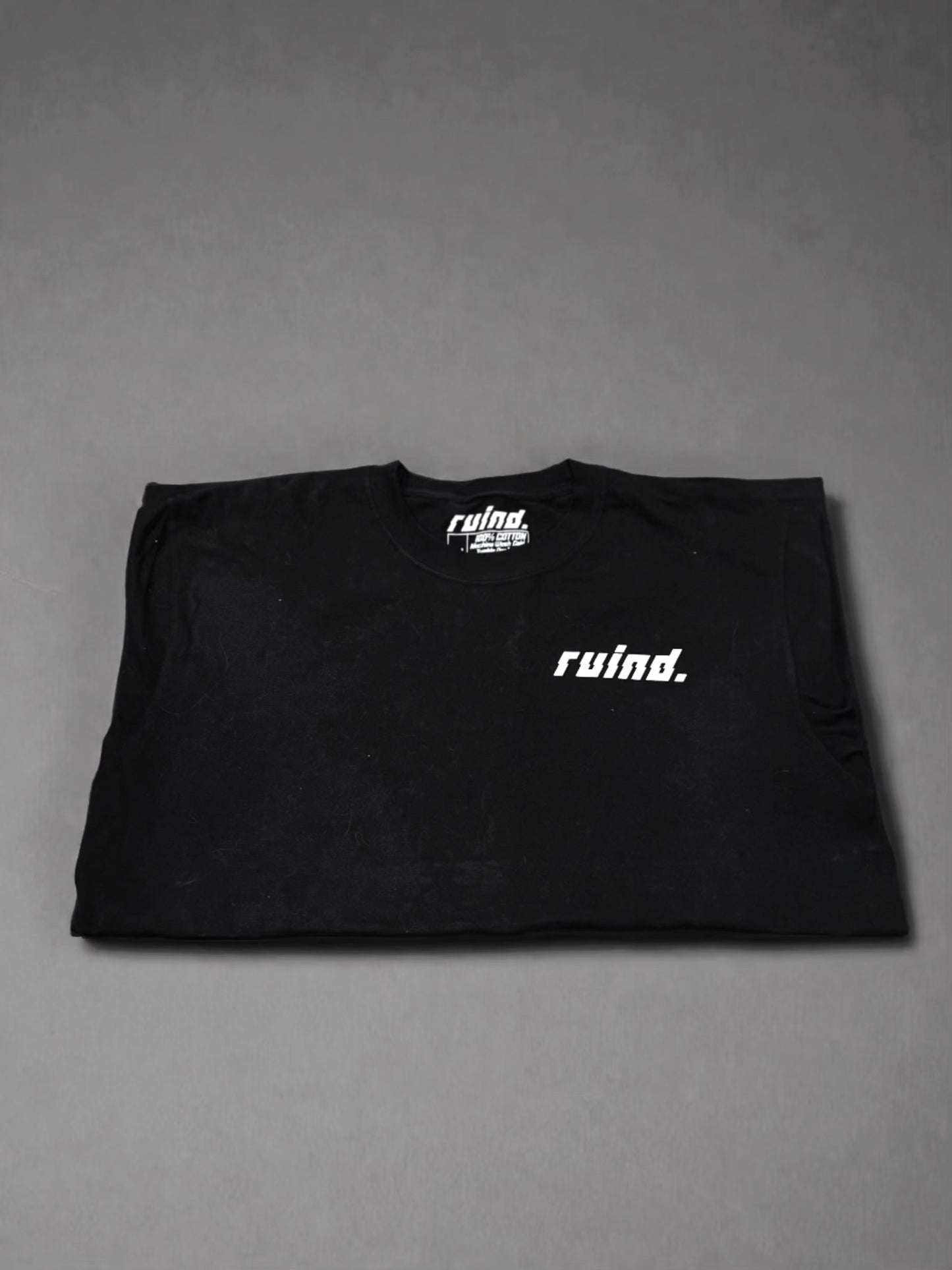 Black t-shirt with 'Ruind Clique' logo on the front left pocket, featuring a minimalist design in bold white.